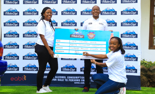 Ag EABL Head of Marketing, Beer, Jean Okech-Nyawara, Kenya Motorsport Federation Chairman Phineas Kimathi & Marketing Manager, Whitecap, Catherine Ndungu during the Kenya National Rally Championship sponsorship cheque presentation. 